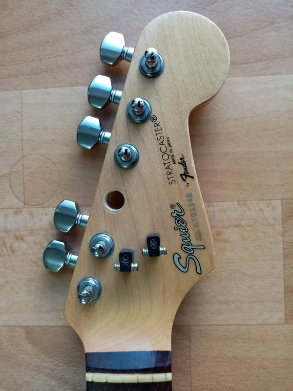Squier Standard Stratocaster headstock tuner hole