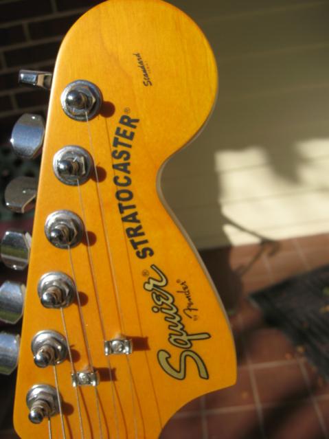 Squier Satin Trans Stratocaster, Amber Finish