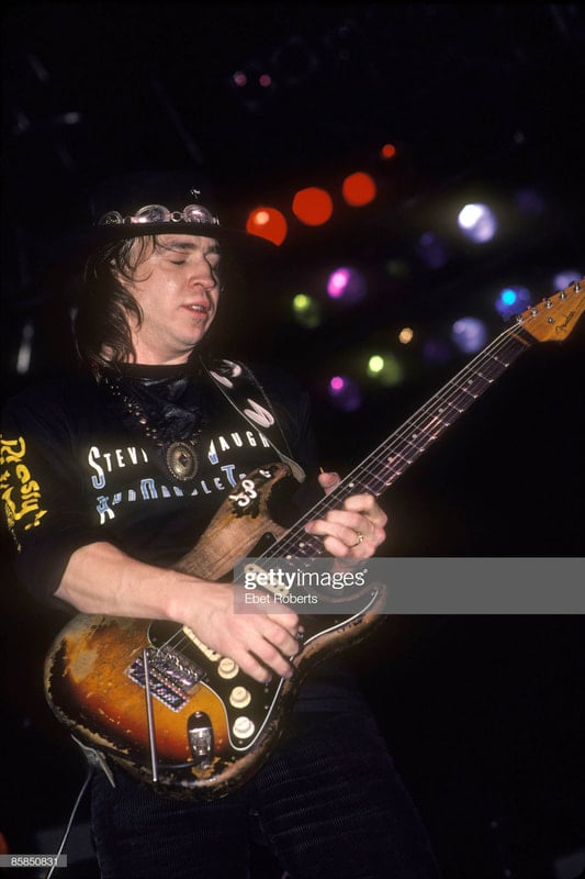 October 22, 1983, Brendan Byrne Arena in East Rutherford, New Jersey (Photo by Ebet Roberts/Redferns) There is still a sort of some insulating tape on the headstock, near the nut. Still black pickguard with no stickers.  No patent numbers, no tremolo bar tip.