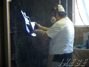 Several coats of paint are applied to the bodies. At the end the painted body is compared with the color sample