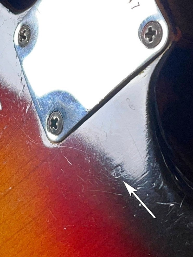 At a close look, you can see the dowel hole under the sunburst finish, 1963 Strat, Courtesy of Recaster