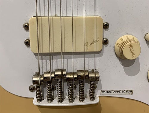 The Bullet H-1 pickup. Note the Fender logo on the cover and the Patent Applied For sticker on the pickguard