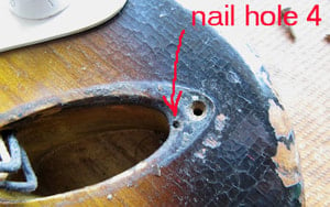 Nail hole under the jack plate