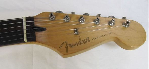 Tex Mex headstock: Spaghetti Logo, vintage style tuning machines and Standard truss rod with black plastic insert