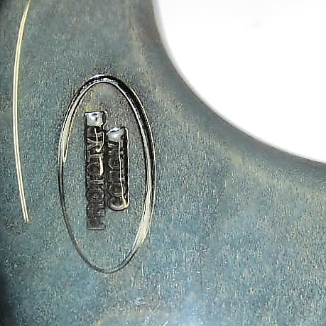 deeply stamped badge in the wood on the back of the body bearing the “Prototype Corona” insignia