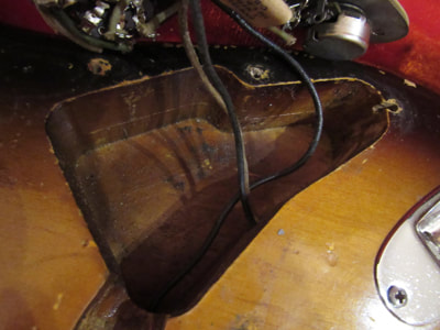 Control cavity route in a 1960 Stratocaster: note the 