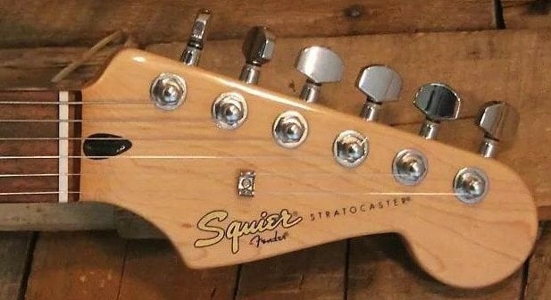Headstock and decals of the Vintage Modified made In India 