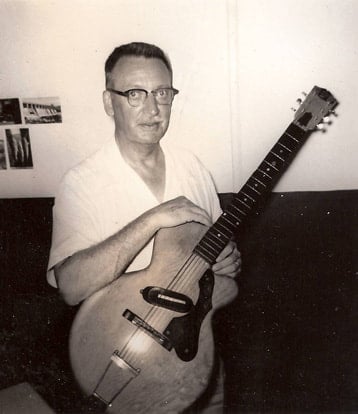 Obra W. Appleton with his APP guitar