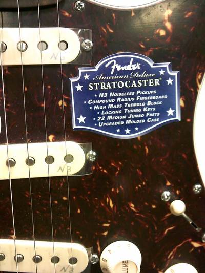 American Deluxe Ash Stratocaster Logo