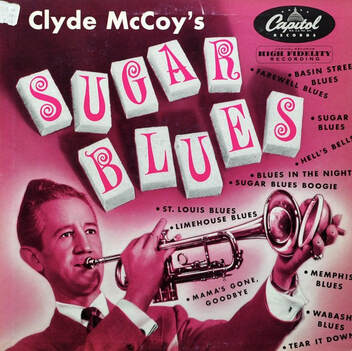 Clyde McCoy sulla copertina del suo Sugar Blues
