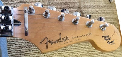 Floyd Rose Standard Stratocaster's headstock  had the Floyd Rose Squier Series Logo 