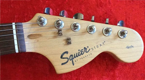 Chinese Squier Affinity Strat large headstock, devoid of black insert